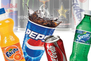 Sugary and acidic soft drinks that wear down the enamel of teeth