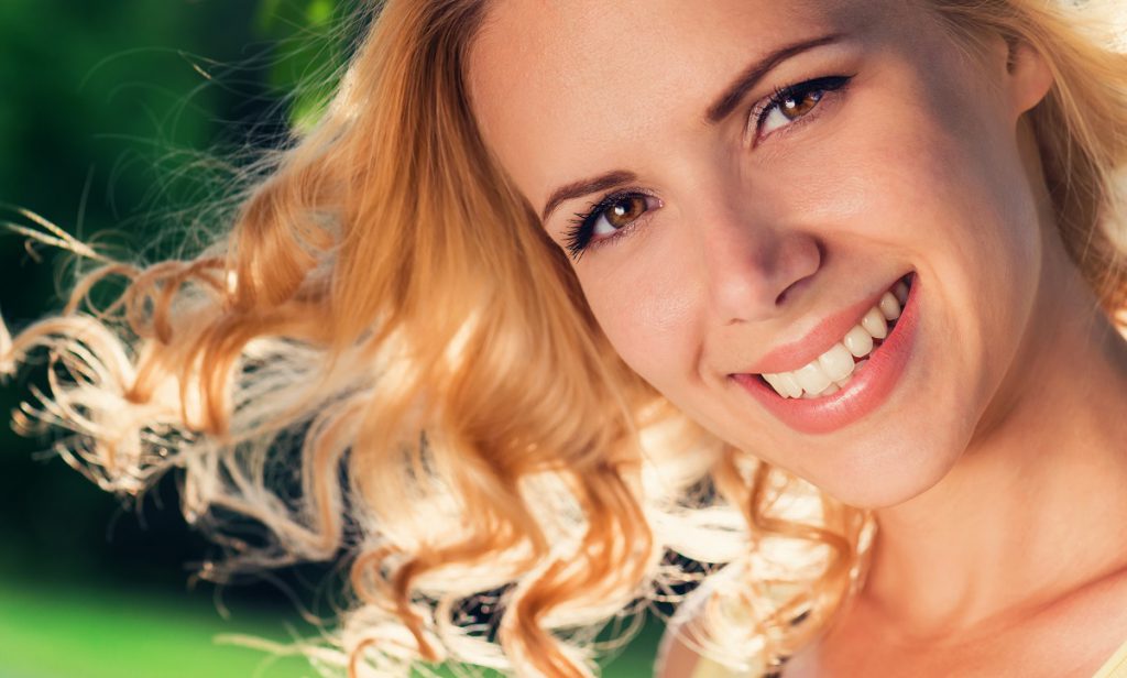 Women who is not a teeth whitening candidate smiling